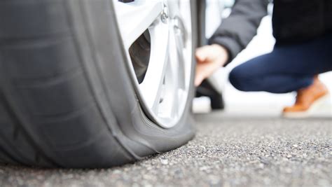 does costco tire center fix flats does it offer roadside assistance?